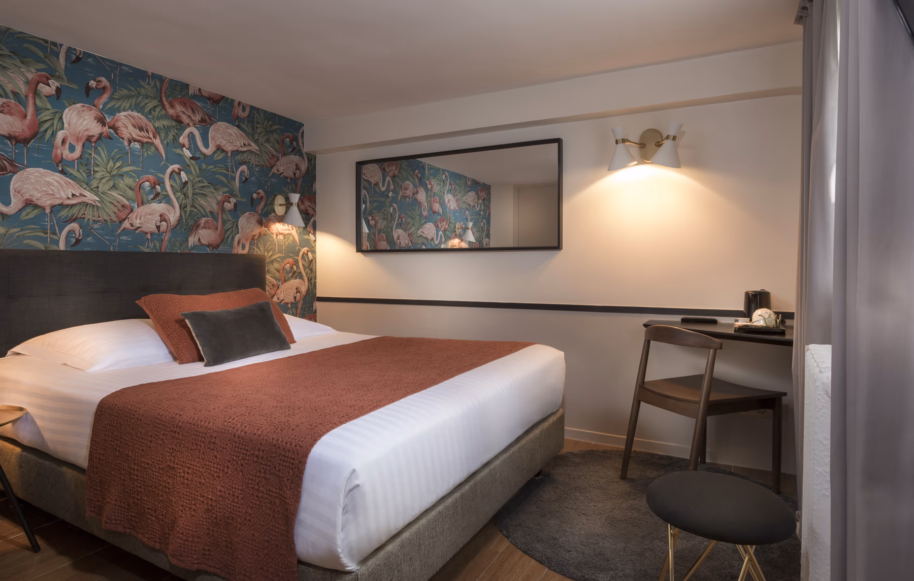 Classic double room with patterned headboard