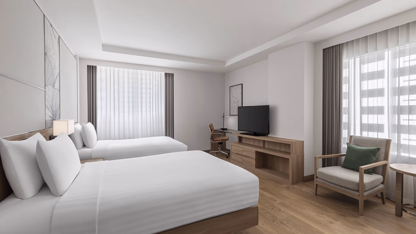 Corner Larger Room, two double beds